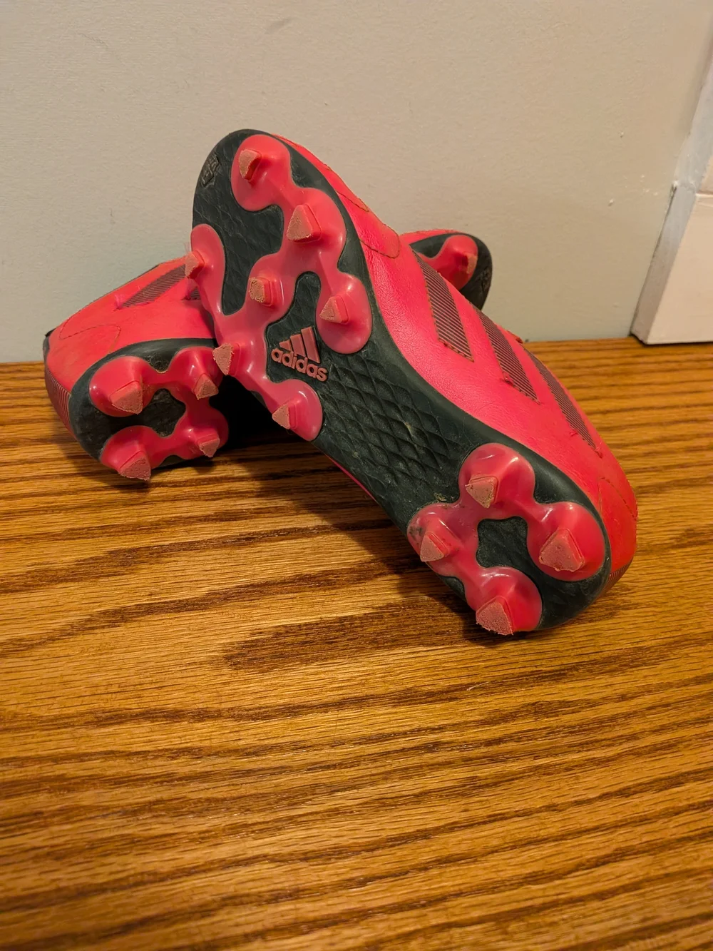 adidas Kids Red Soccer Cleats with Black Stripes